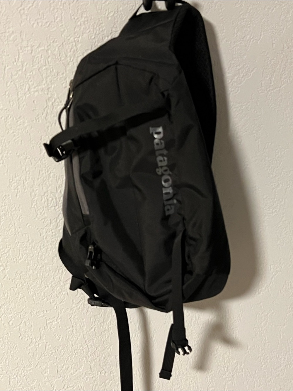 Patagonia Black Sling Pack with Reflective Logo